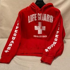 Lifeguard Red Pullover Sweatshirt with front pocket. Size Medium